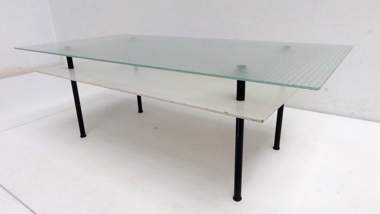 Rare Dutch coffee table produced by Gebroeders De Wit, Schiedam

In the 1930's the 2 brothers (gebroeders) Toon & Martien de Wit worked for Gispen who was at that time the biggest producer of tubular furniture in the Netherlands
After the war de