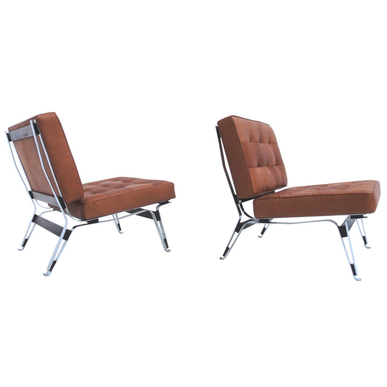 Lovely and important pair of original 1957 Ico Parisi “856” lounge chairs finished in high quality leather, manufactured by Cassina, Meda (Milan), Italy.

Beautiful design with sculptural form super lightweight bent chromed steel frame with solid