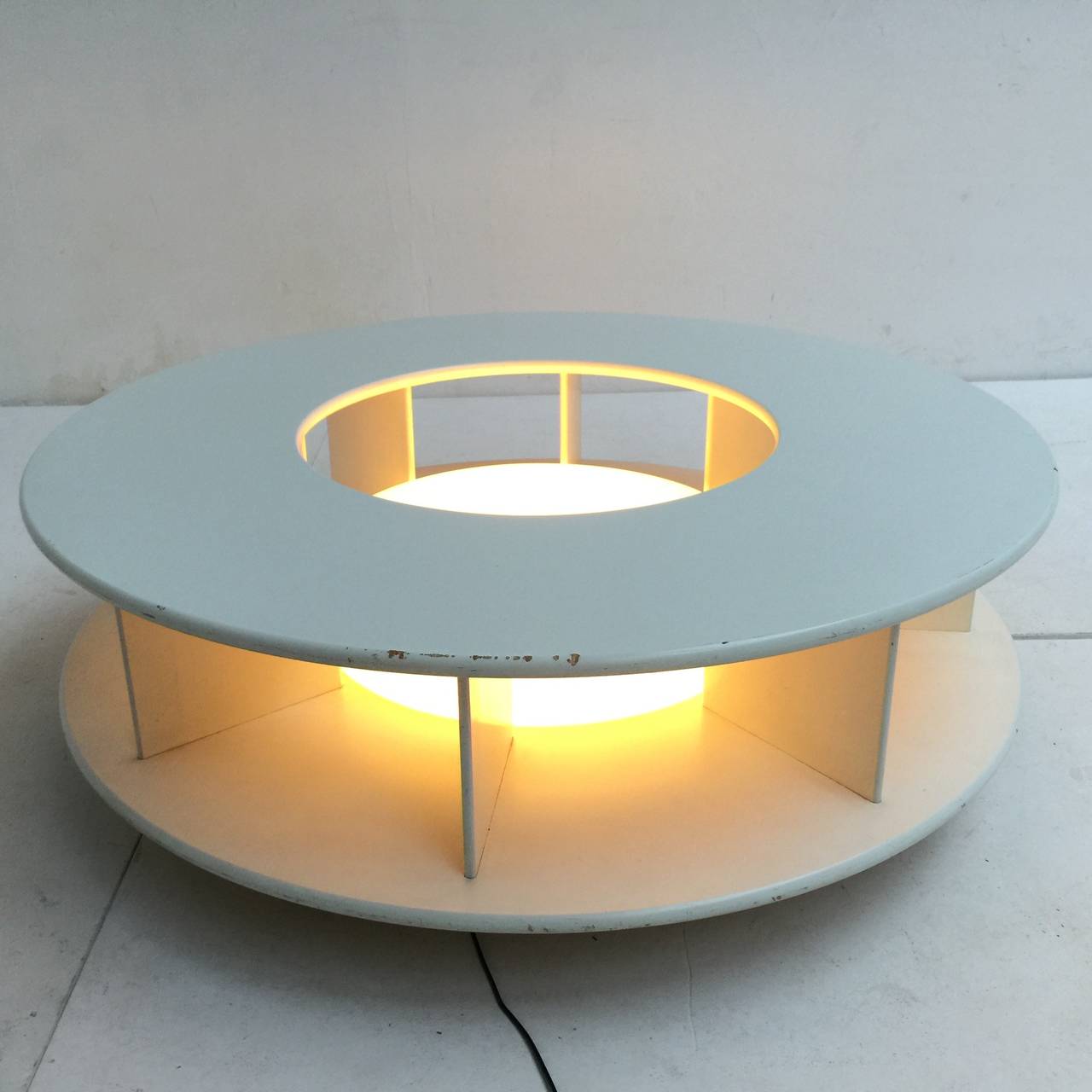 Rare ,beautiful illuminated and revolving 'Bazaar' sofa table designed by the famous radical Florentine architect's group 'Superstudio' in 1968. 

This table was originally designed to accompany the iconic radical Superstudio 'Bazaar' sofa and is