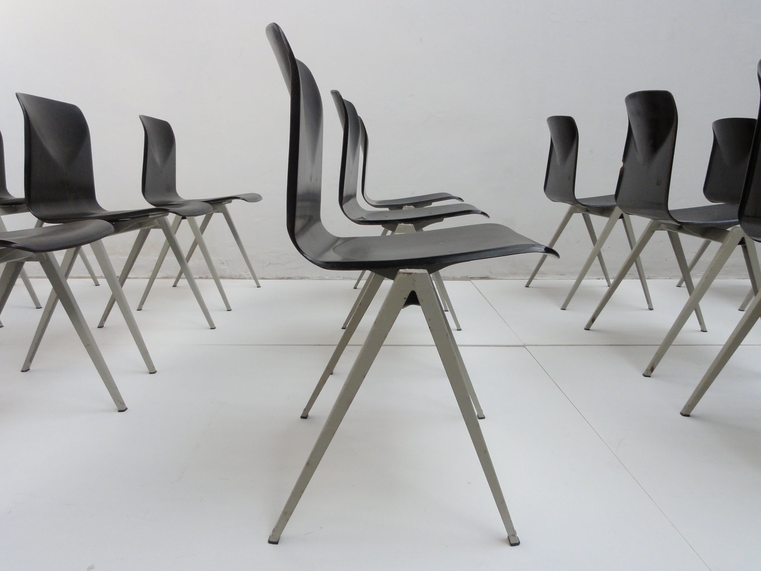 Galvanitas industrial folded metal / pacwood stacking chairs The Netherlands
