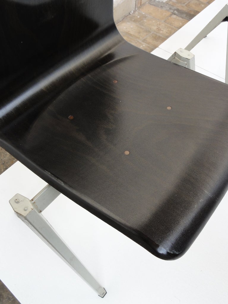 Galvanitas industrial folded metal / pacwood stacking chairs The Netherlands 2