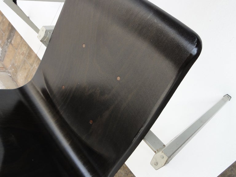 Mid-20th Century Galvanitas industrial folded metal / pacwood stacking chairs The Netherlands