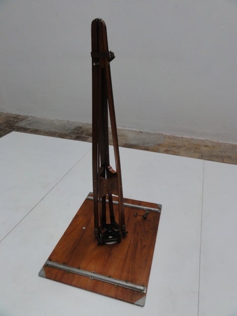A very rare navigation/drawing table on a tripod base produced by Dutch company Ahrend in the 1930's
Design of the table is by founder of the company Harry van der Kamp (1879-1946)

The table features nice brass details in the teak wood top and