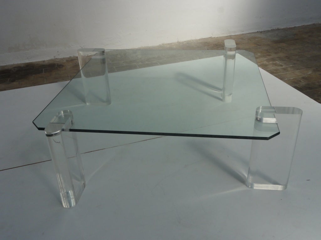 Stunning Karl Springer lucite legs and thick glass coffee table at 1stDibs