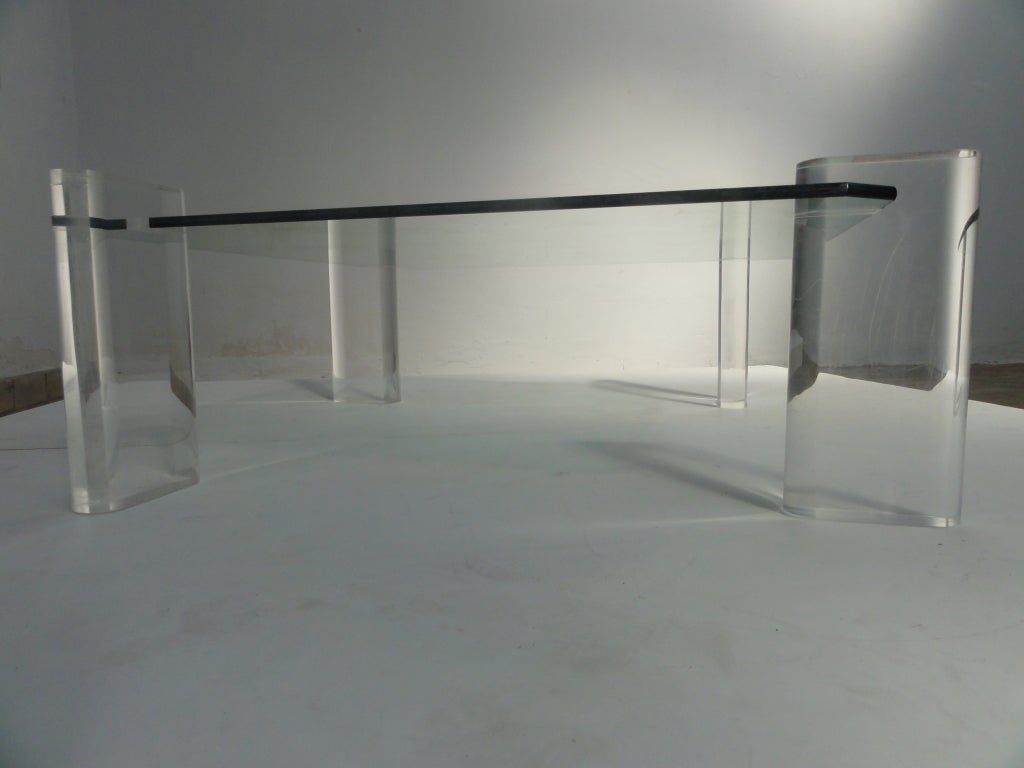 Stunning Karl Springer lucite legs and thick glass coffee table