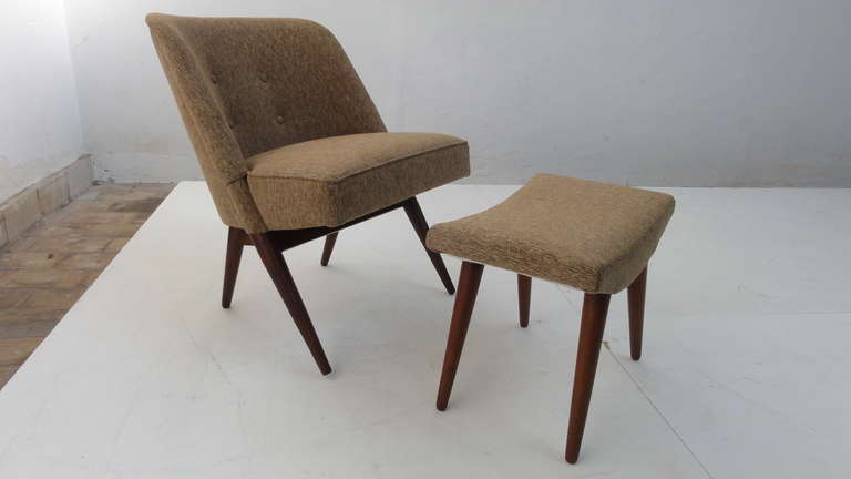 This very sweet looking chair and ottoman came from a complete bedroom  interior designed by Dutch designer A.A. Patijn. The chair and ottoman have been reupholstered in a Van der Ploeg fabric.

A.A. Patijn combined classic and modern in the '50s