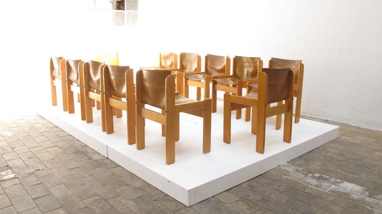 Big set of 12 Italian dining chairs in leather sling seats and birch wood by Ibisco