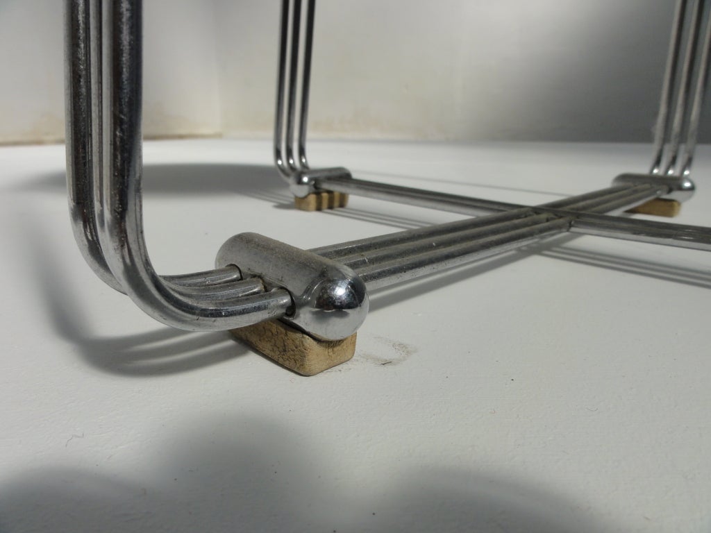 A wonderfull example of machine age / art deco design
Chromed wire base with a die-cast aluminum and cork seat
The stool is marked with a manufacturer's stamp (photo 7) unknown to me