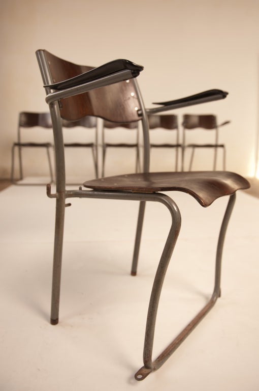 These chairs where commissioned by Dutch architect Sjoerd Schamhart in 1953 for the Grotius Lyceum (school) that is now classified as a national monument in Holland

Only 200 chairs where made and 120 of them survived since 1953

The chair is