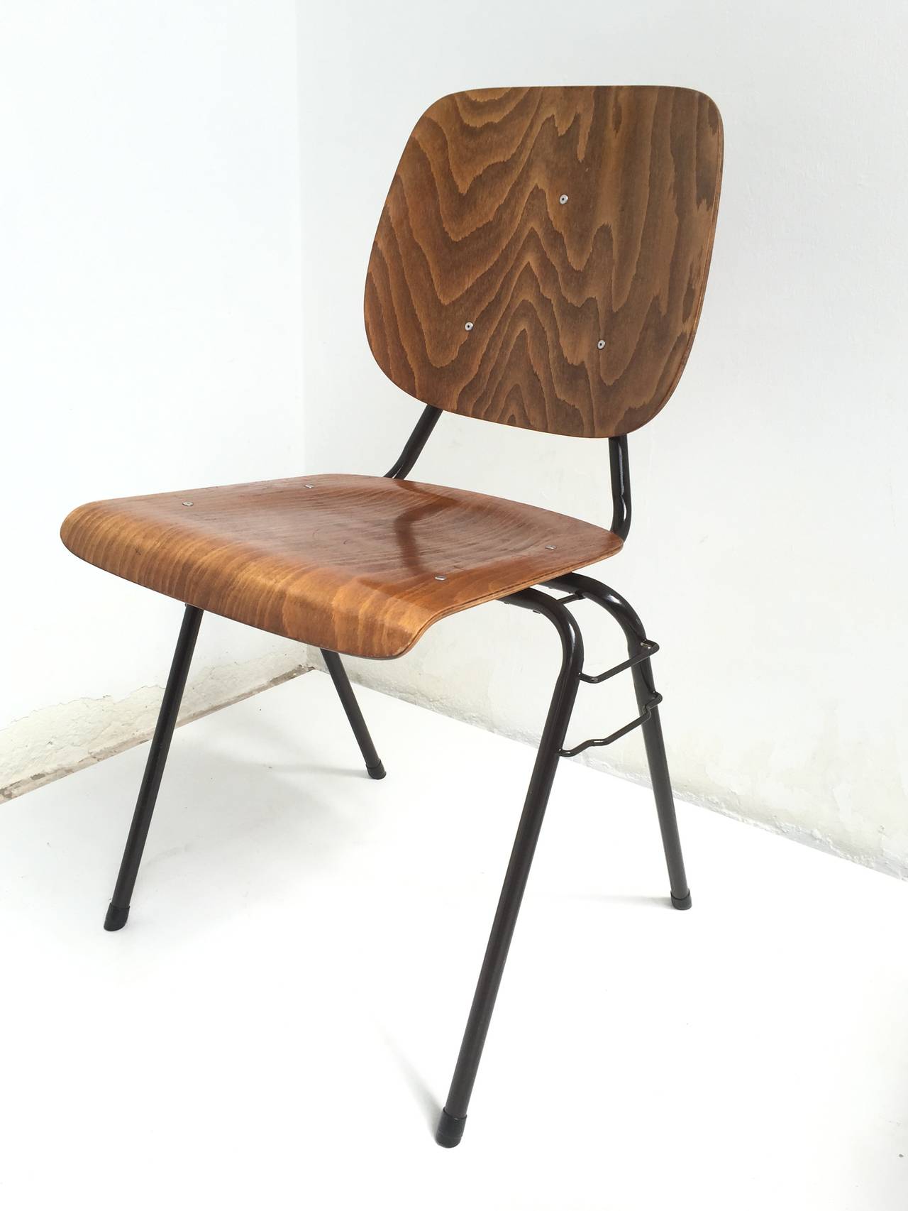 These Model 305 chairs where designed in 1957 by important Dutch pioneer designer Kho Liang Ie for CAR industry Katwijk The Netherlands

This version was purchased in 1963 and has also the link option to make rows of chairs connected in for