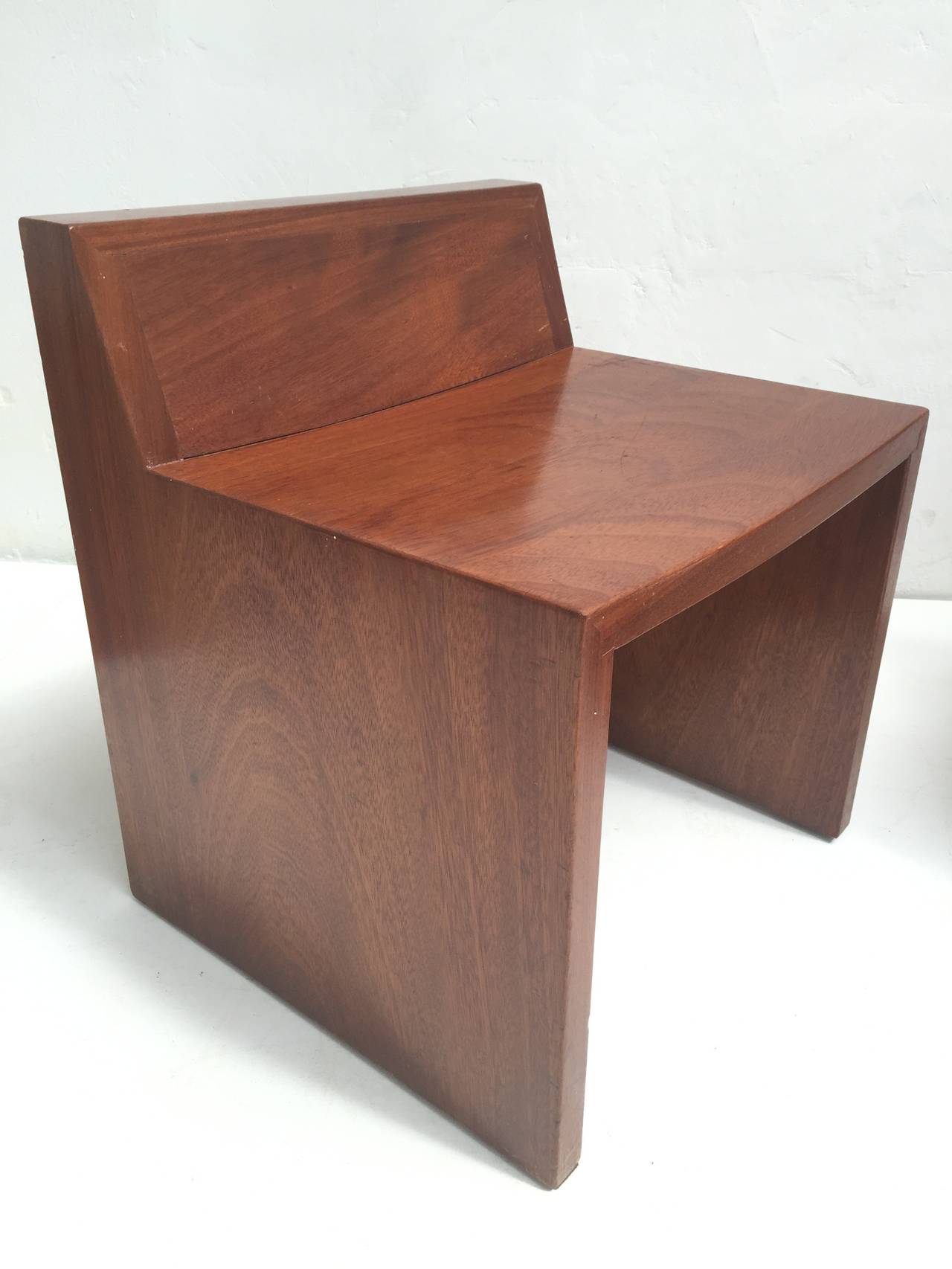This unique one of a kind set of solid mahogany seats comes from a Church by Dutch Architect Harry Nefkens build in 1963 in Bergen op Zoom

Nefkens was clearly inspired by the works of American architect Frank Loyd Wright and created a few fine