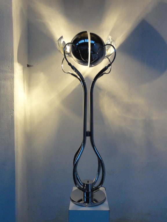 Beautiful, neo liberty style, floor lamp in chromed steel, circa 1965. This lamp closely resembles the style and form of Carlo Mollino's students ,Gabetti and Isola. The four  chromed metal semi spheres,each concealing a light bulb, form an abstract