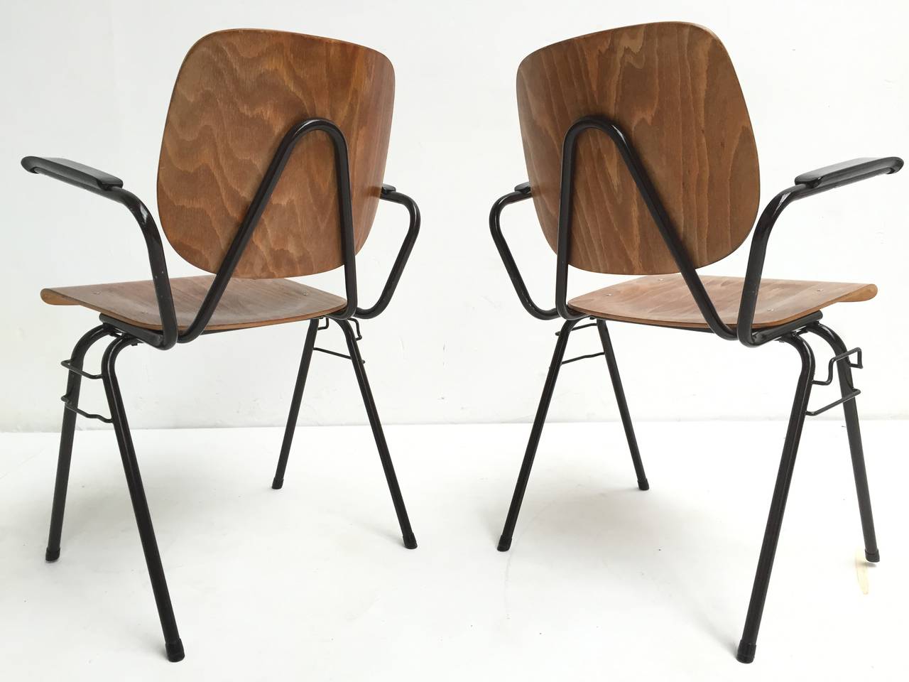 These armchair Model 305 where designed in 1957 by important Dutch pioneer designer Kho Liang Ie for CAR industry Katwijk The Netherlands

This version was purchased in 1963 and has also the link option to make rows of chairs connected in for
