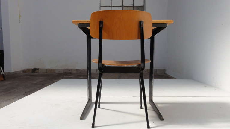 A perfect small leather top customized early production 'Result' school desk by Dutch industrial designer Friso Kramer with a matching early edition 'Result' chair in birch plywood.

This design by Friso Kramer was in collaboration with Wim
