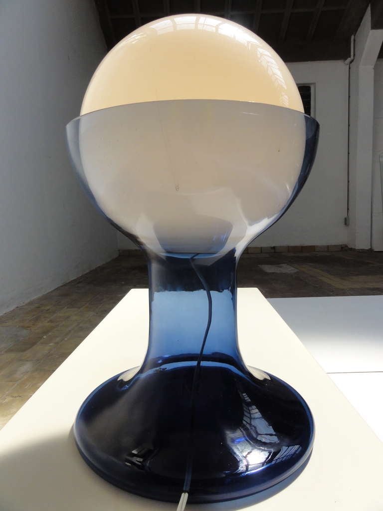 A white Murano glass globe nested into an Aegean blue Murano glass base

A design by Carlo Nason and produced by the famous Mazzega glass studio's based in Murano, Italy