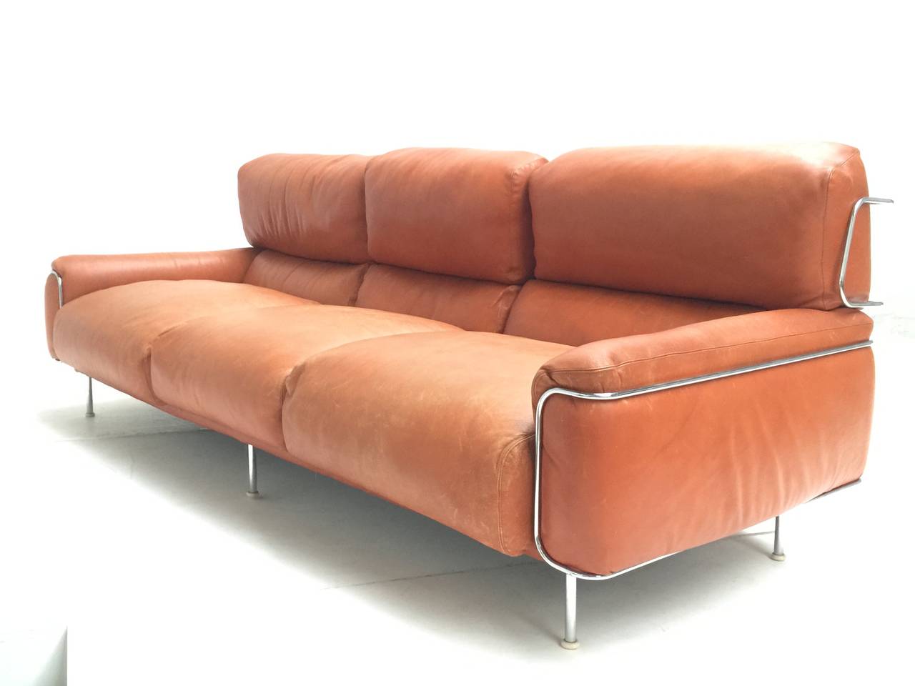 Very rare find, super rare and elegant three-seat sofa by Italian designer Vittorio Introini for Saporiti. The supporting frame is made of chromed steel. This sofa was designed in 1968 and is published in the italian design periodical Abitare, issue