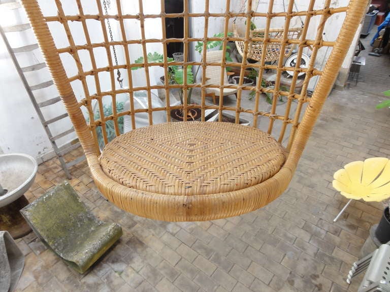 Rohe was a company that was based in the centre of the Dutch Bamboo & Cane industry area of Noordwolde.
Skilled craftsman made the most beautiful furniture in Bamboo and Cane.

This iconic 60's symbol, the hanging chair is a fine example of their