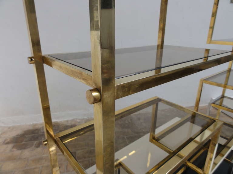 Rare and beautiful monumental geometric form brass and chromed steel shelving unit by italian designer Romeo Rega.
This is functional sculpture at its best reminiscent of Sol Lewitt's  minimalist studies in form, e.g his serial projects and