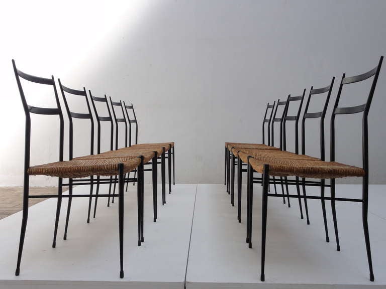 10 Superleggera style chairs attributed to Gio Ponti , Bijenkorf 1