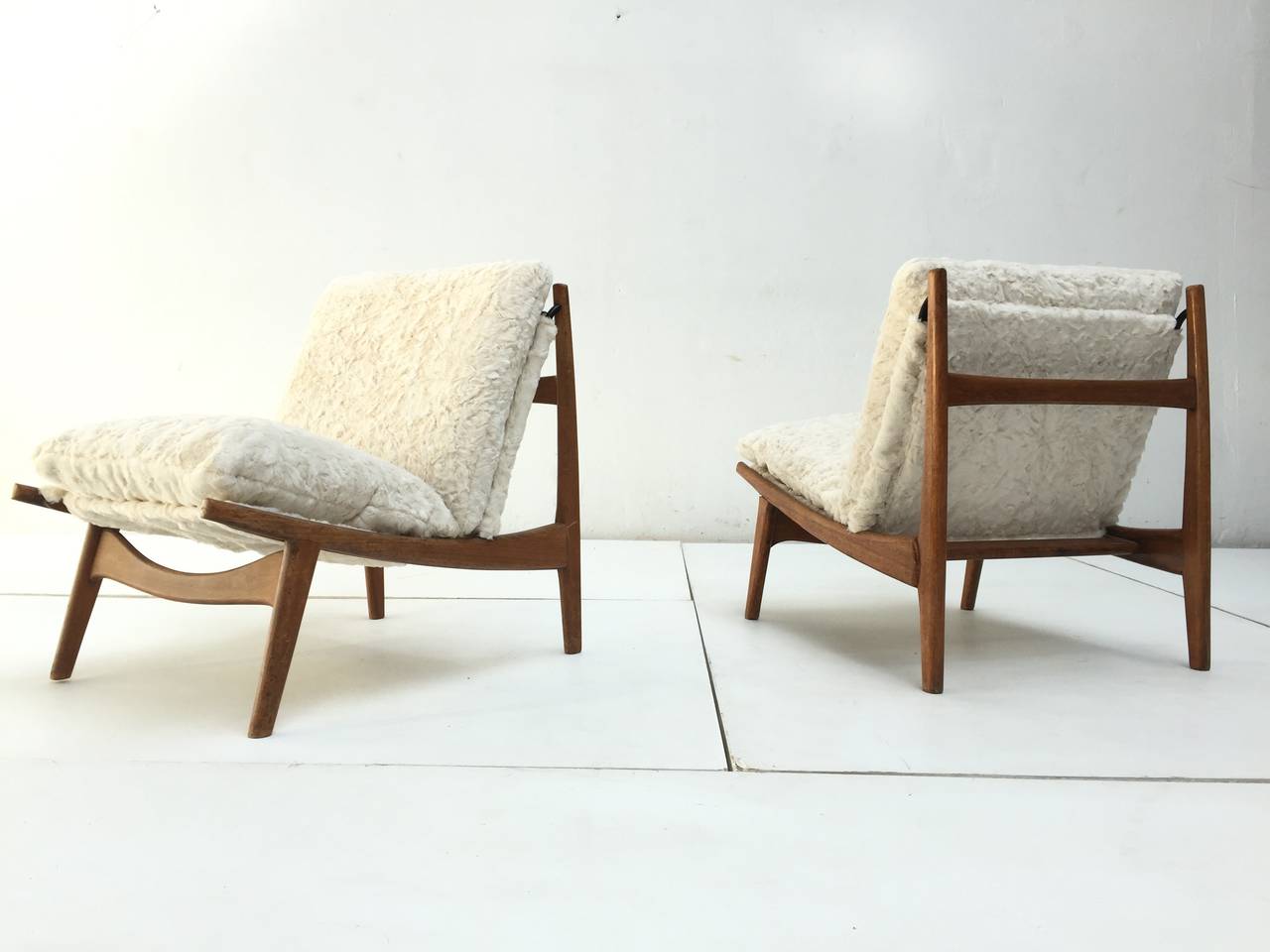 Pair of beautiful, organic form, model '790' lounge chairs designed by Joseph Andre Motte (1925-2013) for Steiner, France in 1960. 

To complement the stunning organic form of the oakwood structure and to further maintain the original