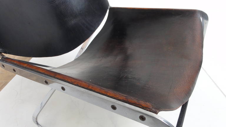 Ra chair by Dutch designer Pierre Thielen 1960’s 

This chair is only produced in very small numbers  late 1960's and was purchased at Metz & Co the modern furniture store in Amsterdam

The complex shape of the steel and use of materials made this