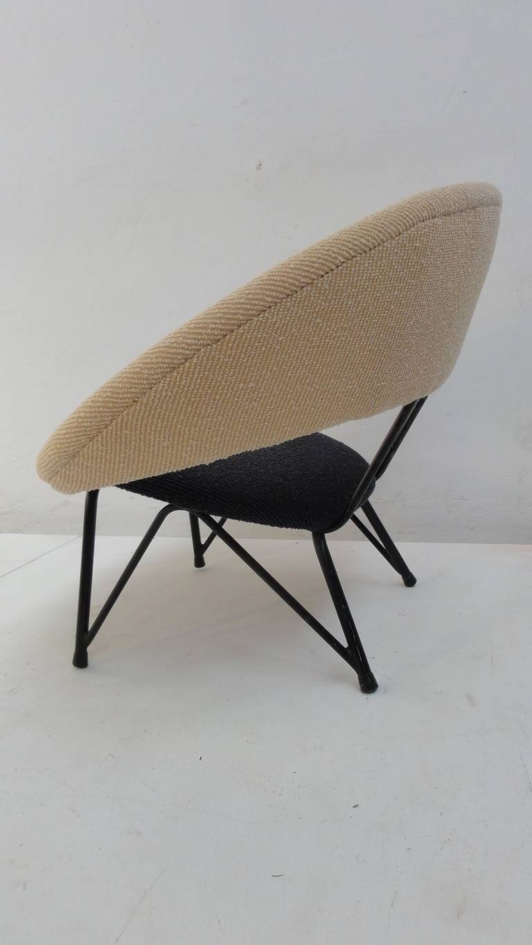 Extremely rare and stunning sculptural form  Italian  'Saturno' lounge chair circa 1955 very much in the style of Dangle and Defrance's  1957 'Saturno' lounge chair  which was produced by Burov in France but with  a lovely sculptural cross bracing