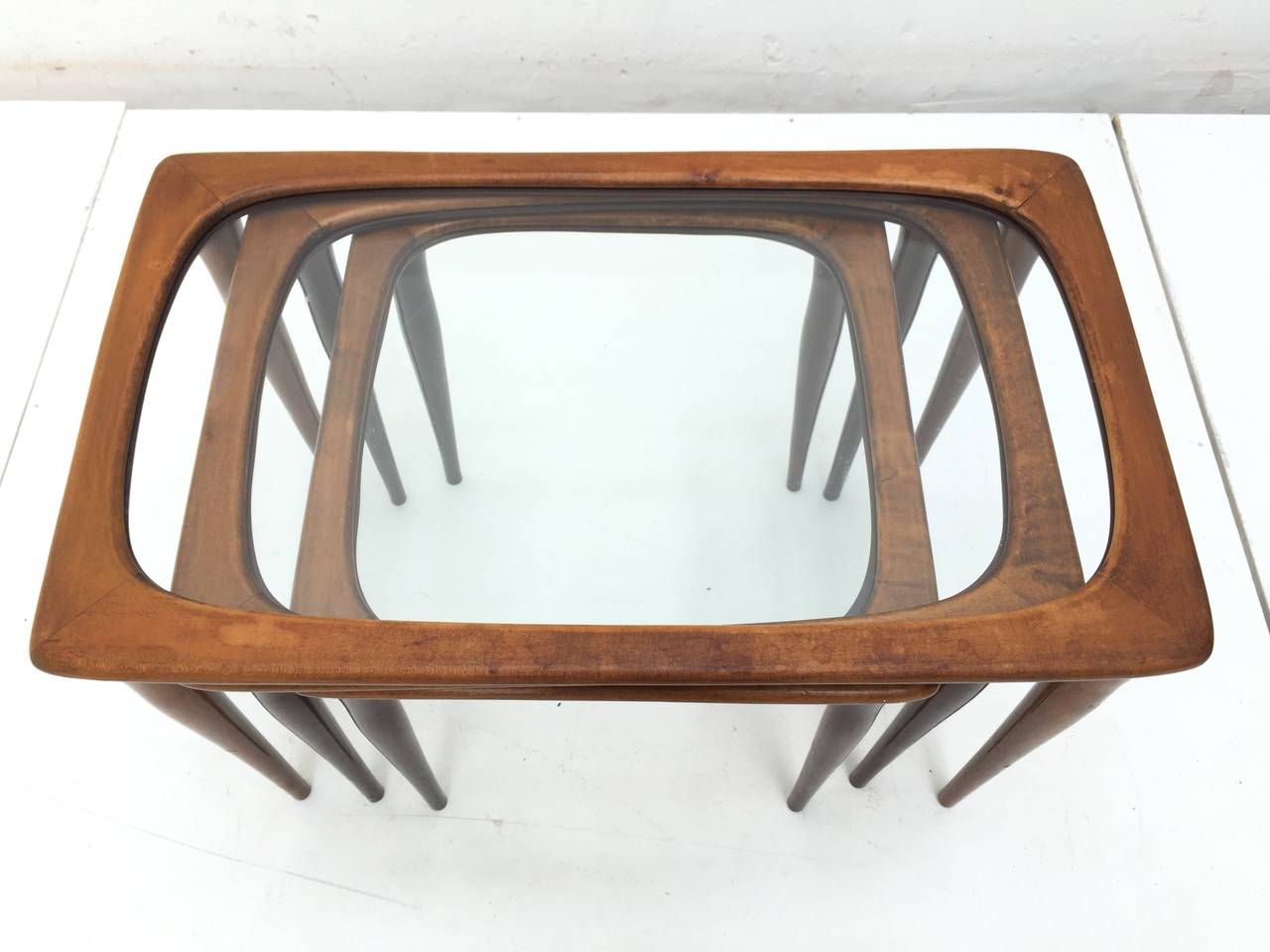 Mid-20th Century Walnut and Glass Organic Nesting Tables Attributed to Cesare Lacca for Cassina