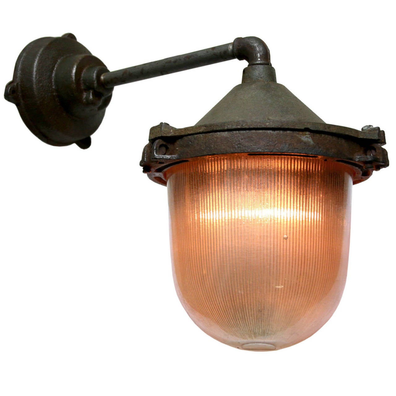 Cast iron industrial wall light. Holophane glass. weight: 7.5 kg / 16.5 lb. For use outdoors as well as indoors. 

All lamps have been made suitable by international standards for incandescent light bulbs, energy-efficient and LED bulbs with an