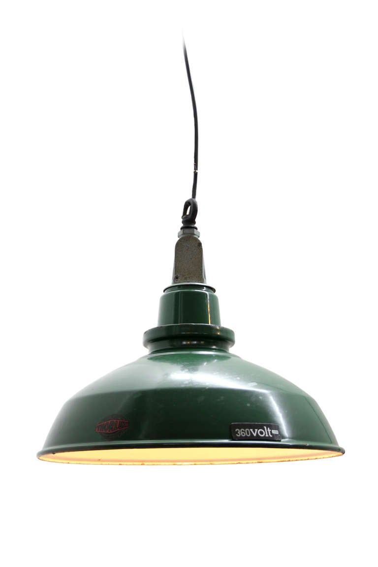 Vintage industrial hanging lamp. Green enamel with white interior. Metal top. Weight | 2.0 kg / 4.4 lb.

All lamps have been made suitable by international standards for incandescent light bulbs, energy-efficient and LED bulbs with an E27 socket,