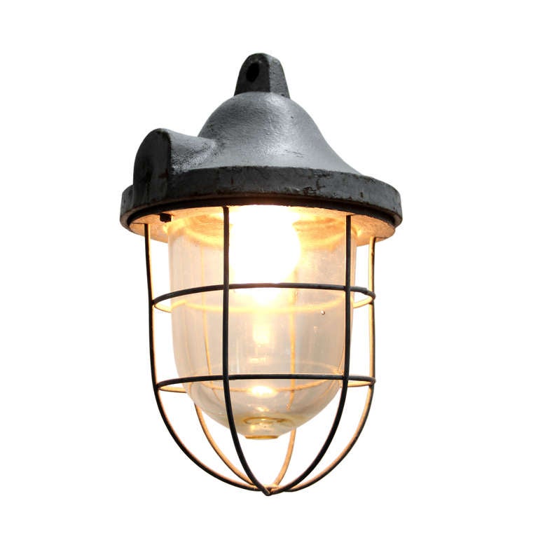 Vintage European industrial hanging lamp. Cast aluminium top with clear glass. weight | 3.5 kg. Several pieces in stock. Priced individually.

All lamps have been made suitable by international standards for normal light bulbs, energy-efficient