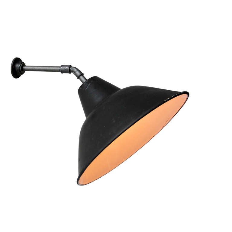 Black enamel, cast iron industrial lamp. weight | 1.7 kg / 3,7 lb. For use outdoors as well as indoors.

All lamps have been made suitable by international standards for incandescent light bulbs, energy-efficient and LED bulbs with an E27 socket,