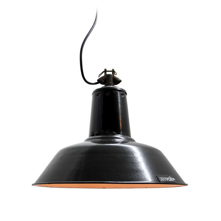 Warehouse, industrial hanging lamp. Thick dark black enamel shade with white interior. Weight 1.7 kg / 3.7 lb.

All lamps have been made suitable by international standards for incandescent light bulbs, energy-efficient and LED bulbs with an E27