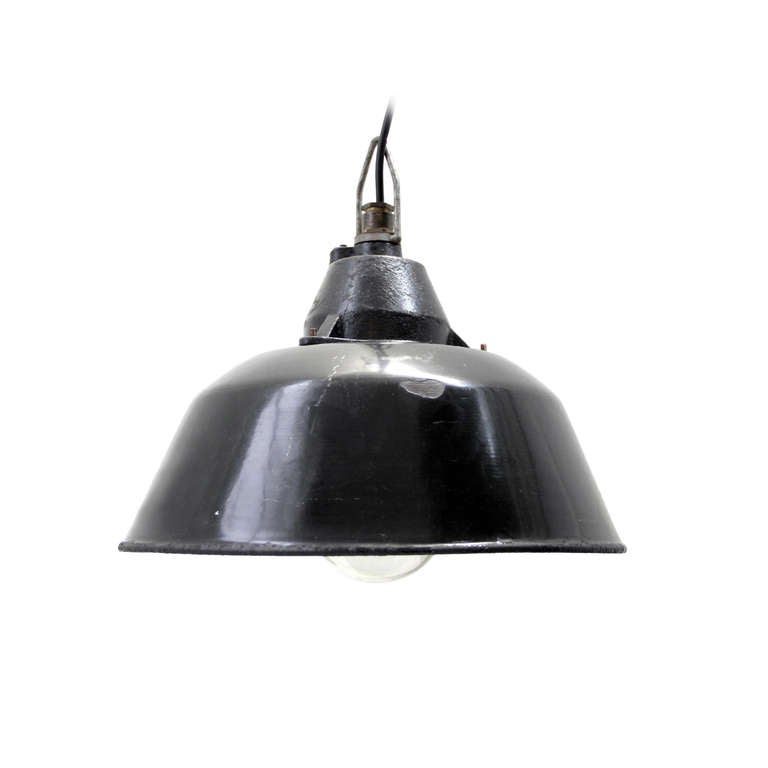 Black industrial pendants. Enamel with cast iron top and glass cover. weight : 3.0 kg / 6.6 lb.

All lamps have been made suitable by international standards for incandescent light bulbs, energy-efficient and LED bulbs with an E27 socket, max