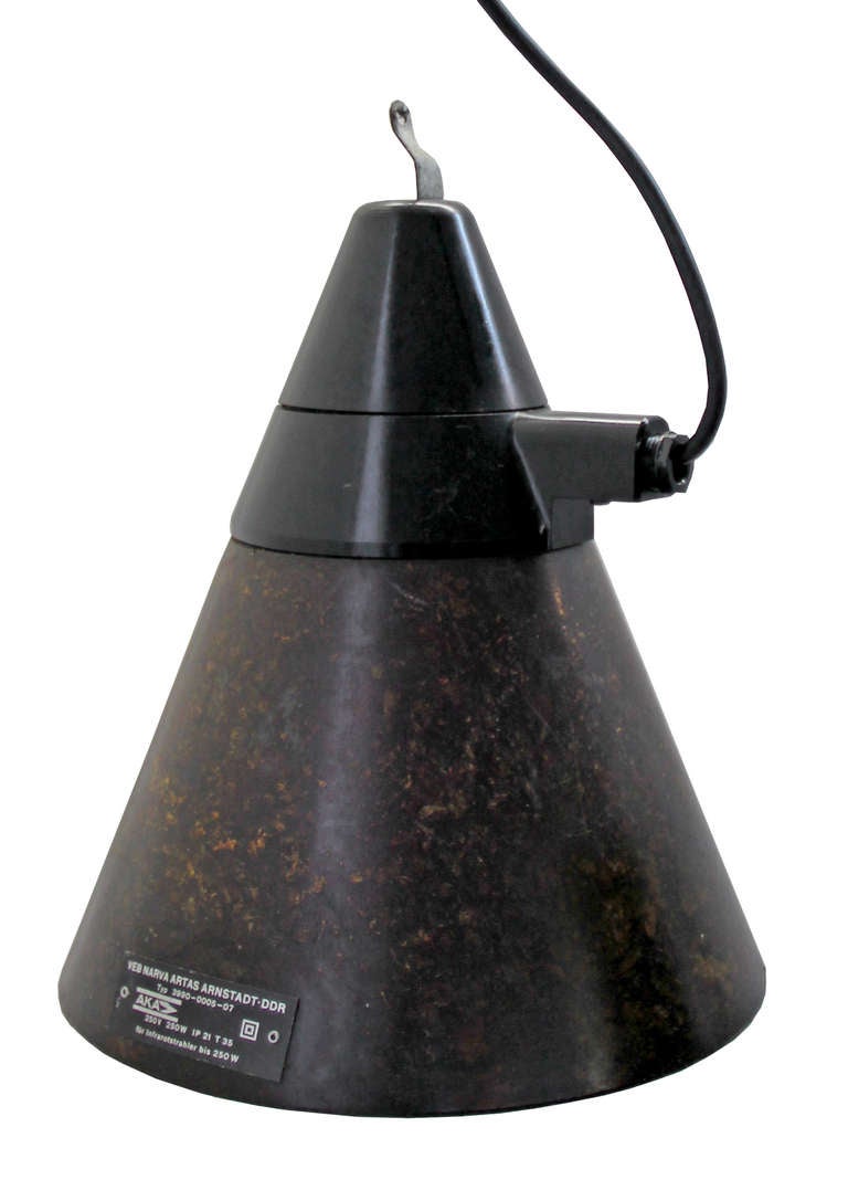 Industrial Bakelite lamps from the DDR. (Former East-Germany). weight | 1.0 kg / 2,2 lb.

All lamps have been made suitable by international standards for incandescent light bulbs, energy-efficient and LED bulbs with an E27 socket, max 150W. 100%