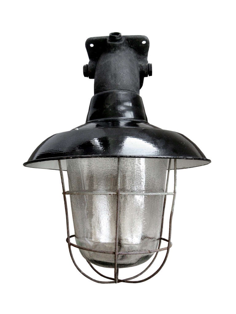 Industrial wall lamp. Black enamel shade white interior. Cast Iron wall mount<br />
glass bowl. weight | 6.0 kg / 13.2 lb.<br />
<br />
All lamps have been made suitable by international standards for incandescent light bulbs, energy-efficient and