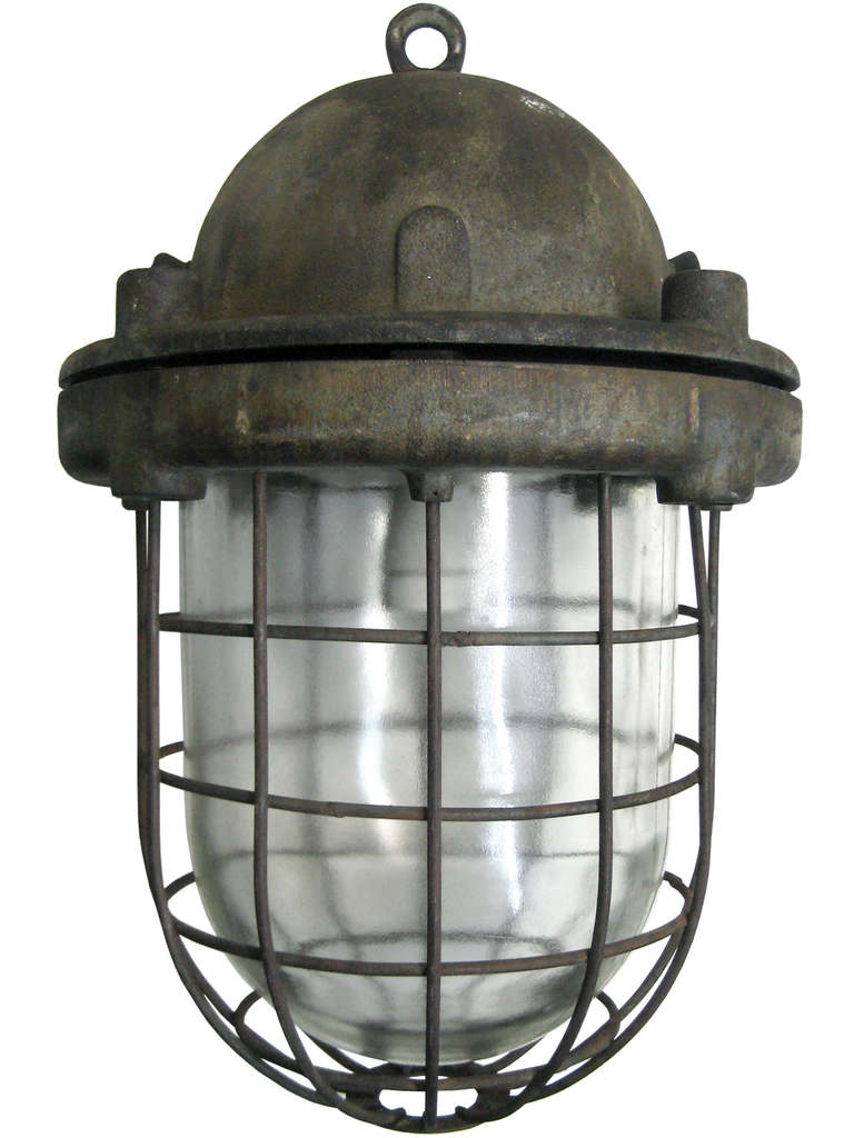 Big heavy factory lamp. Cast iron with clear glass. Weight: 29.0 kg or 63.9 lb.<br />
<br />
All lamps have been made suitable by international standards for incandescent light bulbs, energy-efficient and LED bulbs with an E27 socket, max 150W. 100%