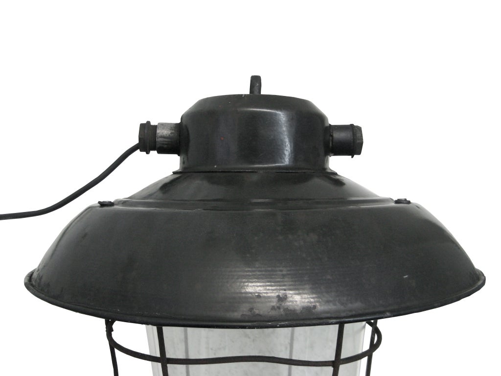 Black enamel Industrial lamp. With clear glass. 

weight: 3.0 kg / 6.6 lb

For use outdoors as well as indoors. All lamps have been made suitable by international standards for incandescent light bulbs, energy-efficient and LED bulbs. E26/E27