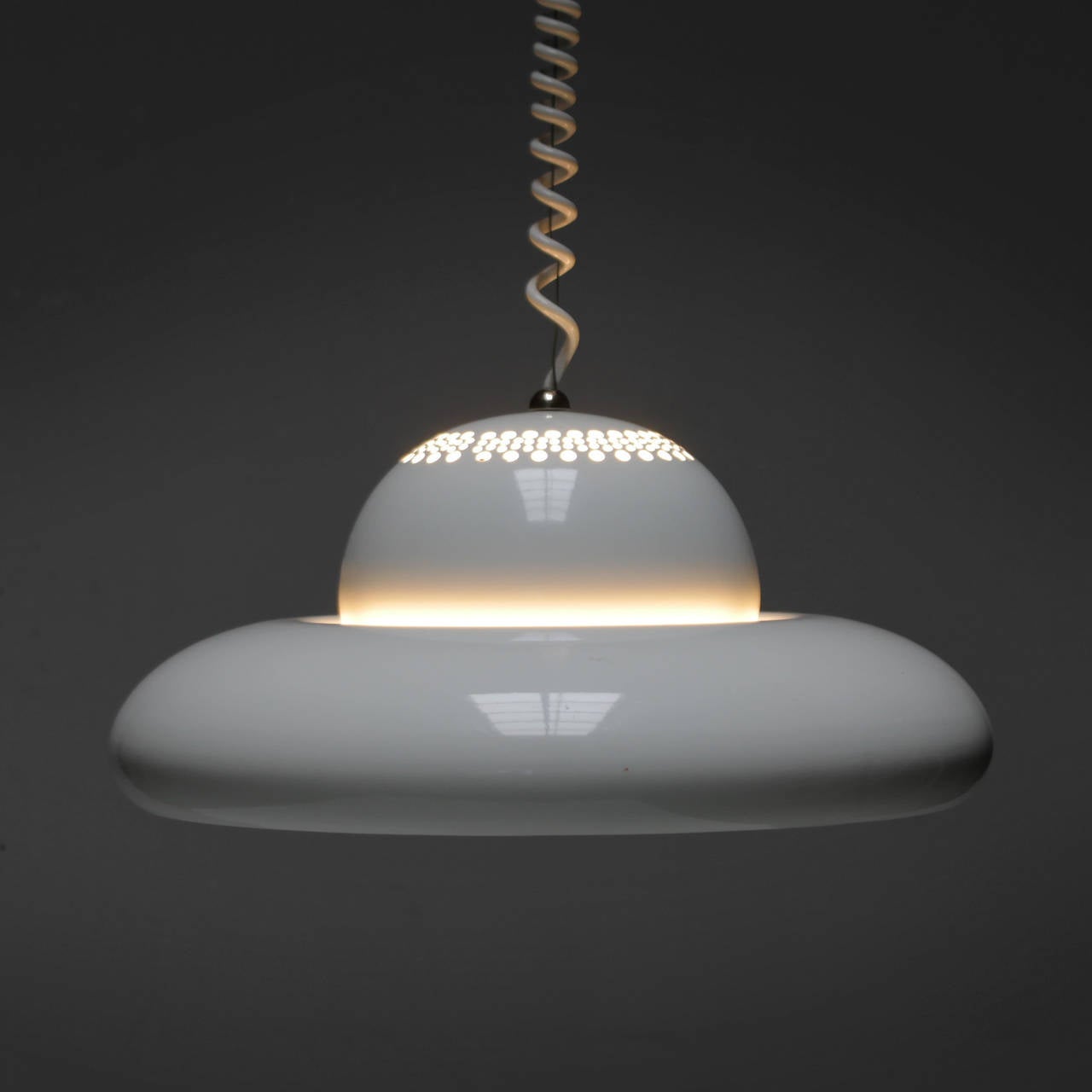 Unique Pendant Light by Afra & Tobia Scarpa. Like new, comes in original box.

The Fior di Loto (Lotus Flower) ceiling fixture was designed at the same time as the slightly larger Nictea and is one of the first models ever produced by the