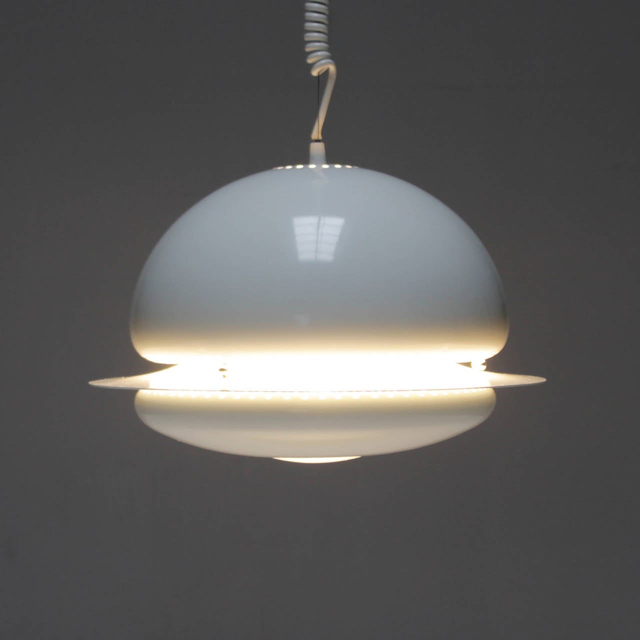 Unique pendant lights by Afra & Tobia Scarpa. Like new, comes in original box. We have two of this lamps in stock.

The Nictea ceiling fixture was one of the first models ever produced by the famous Italian lighting company Flos. Production of