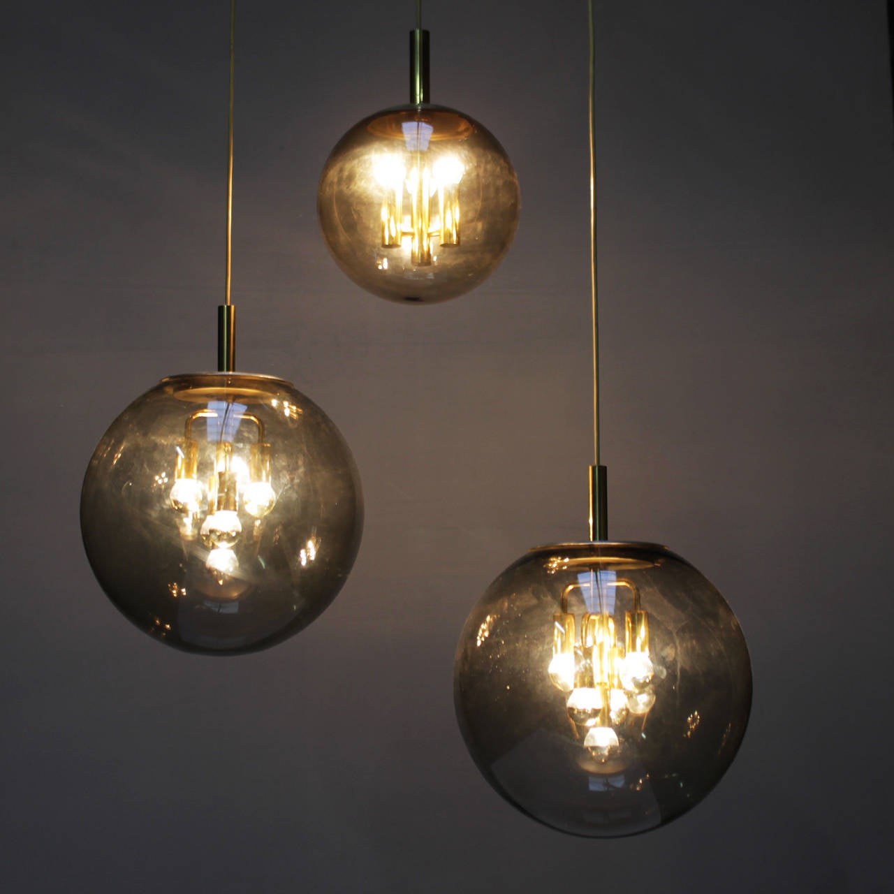 Large globe lights by Doria Germany. Two sizes: diameter 15.7 in. (40 cm) and diameter 11.8 inches (30 cm). We can offer you three globes of 11.8 inches (with three bulbs each) and two globes of 15.7 inches with five bulbs.
Price per piece: for a