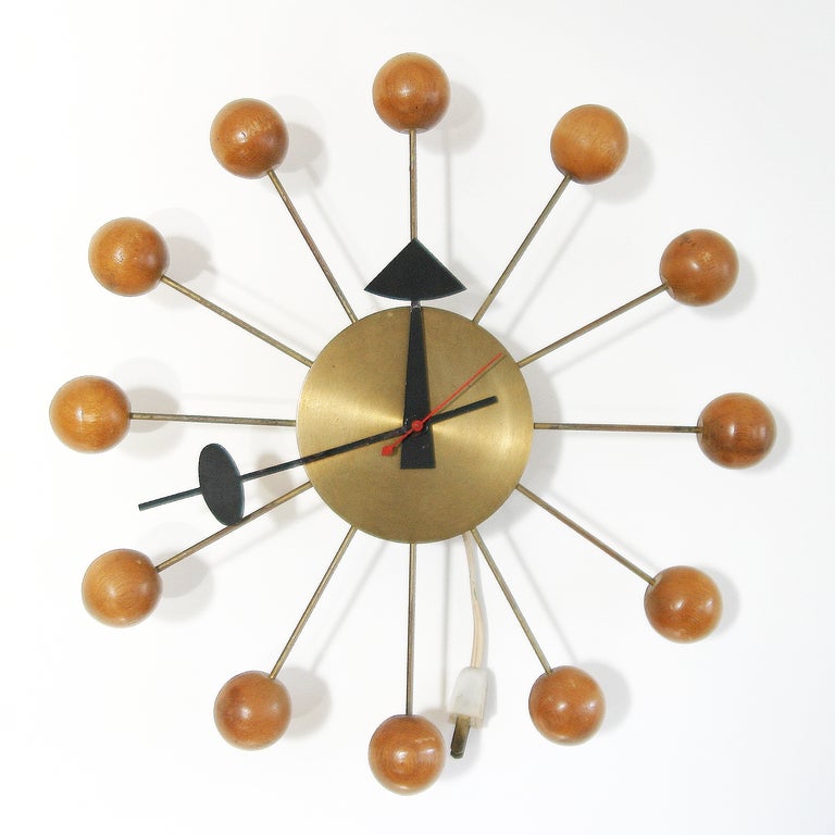 Collection of clocks by George Nelson and Irving Harper for Howard Miller Clock Company, Zeeland Michigan. One Basket Oval 2216. Two Sunbursts 2202. Two Ball Clocks 4755 (one electric, the other with a key) and a 'Meridian Clock' by Raymor (battery