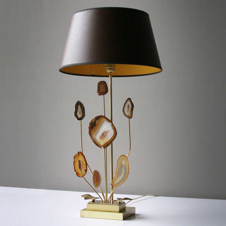 Beautiful table lamp attributed to Willy Daro, Belgium, 1970's.
Nickel plated brass with seven agates and a vinyl brown shade.
Height with shade: 28.7 inches (73 cm). Shade: diameter 15.7 in. (40 cm) and height: 8.4 inches (21,5 cm).