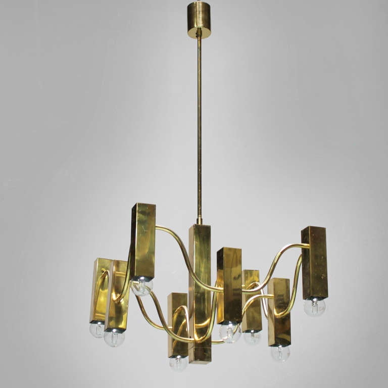 Brass chandelier by Gaetano Sciolari with eight lights. Total height: 33.0 in. (84 cm), diameter 16.1 inches (41 cm).