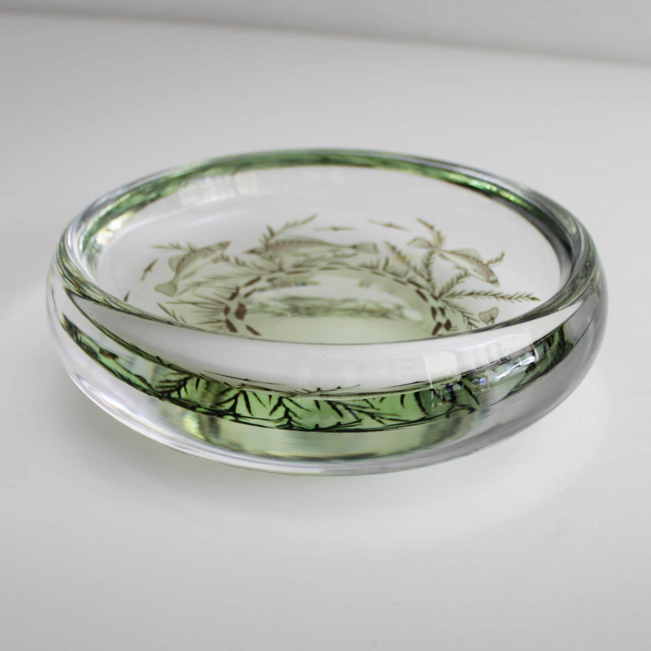 Orrefors 'Graal' bowl by Edward Hald, Sweden. This bowl or ashtray is hard to find. Thick walls of clear glass encasing a design of fish swimming, etched Orrefors Graal Edward Hald on the base.