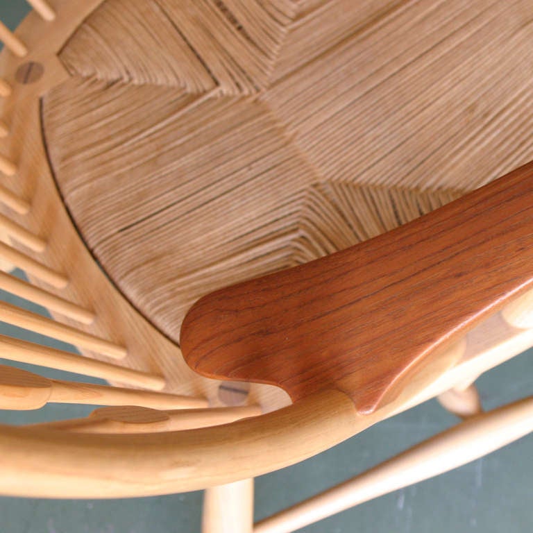Hans J. Wegner 'Peacock' Chair for Johannes Hansen. Really in the most beautiful condition. Manufactured in the seventies but no stains or scratches.
Model JH 550, ash, teak armrests. Branded 