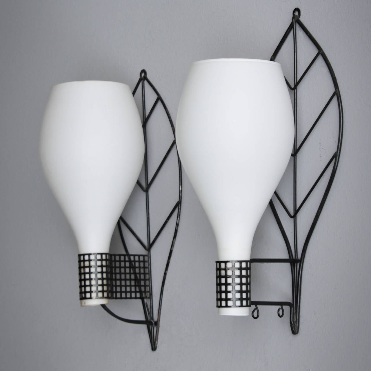 Coppia decorativa di applique a forma di foglie
