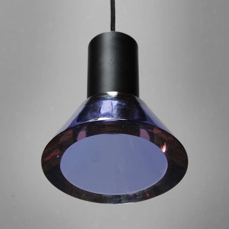 Crystal violet glass pendant by Flavio Poli for Seguso Vetri d'Arte, Murano, Venice Italy. Some scratches to the bottom and a chip to the side (see images 4 and 7). New black cotton wire.
Measurements: height 8.7 in. and diameter 7.3 inches.