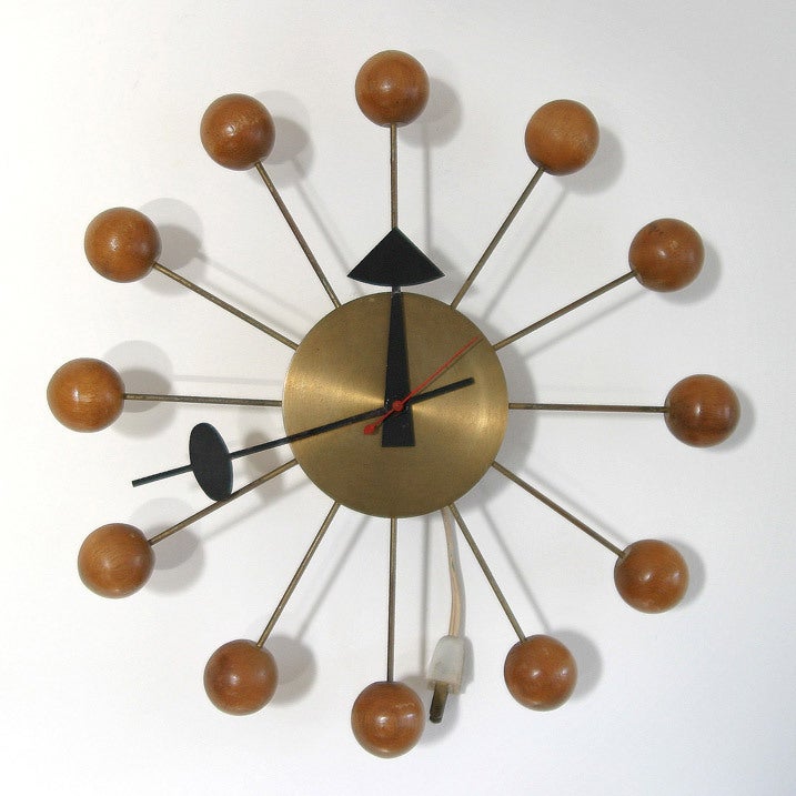 Vintage original George Nelson Ball Clock 4755. Design by Irving Harper. Manufactured by Howard Miller Clock Company, Zeeland Michigan. Marked. Original clockwork (115V/60Hz).