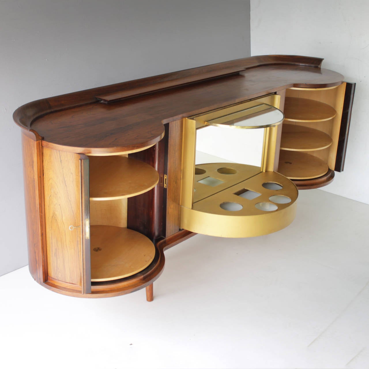 Dry bar in rosewood, design by A.A. Patijn for Zijlstra, Joure Holland. Complete and in a good condition. Interior in birch and mirror glass.