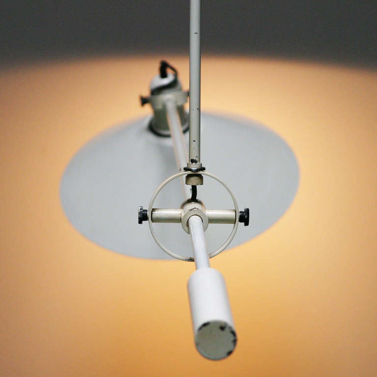 Anvia Counterbalance Ceiling Lamp by J.J.M. Hoogervorst, Dutch 1950’s.

Anvia was founded in the 1930’s by German emigres. By employing J.J.M (Jan) Hoogervorst the company became a mayor player in the Dutch lighting industry in the 1950’s and